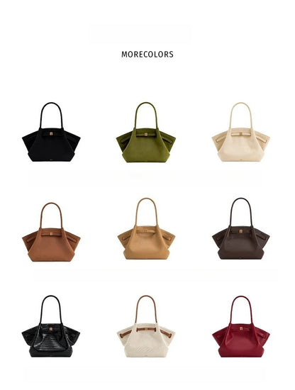 Collection of handbags in various colors on a white background