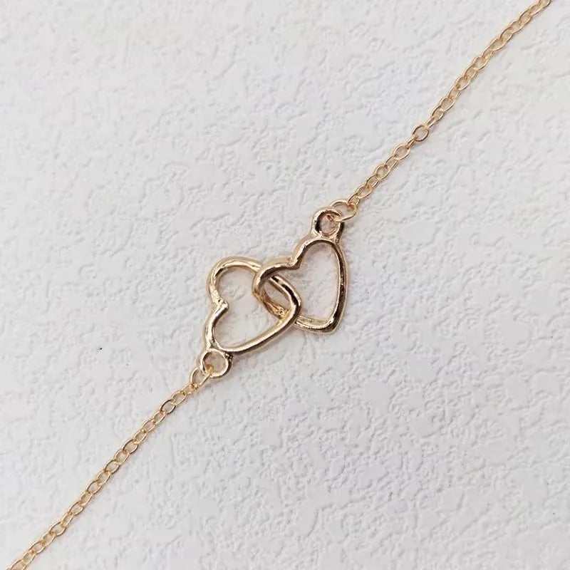 Collar con colgante de doble corazón simple para mujer, pareja, gargantilla de acero inoxidable, cadena de color dorado, joyería de regalo para fiesta de bodas y amigos